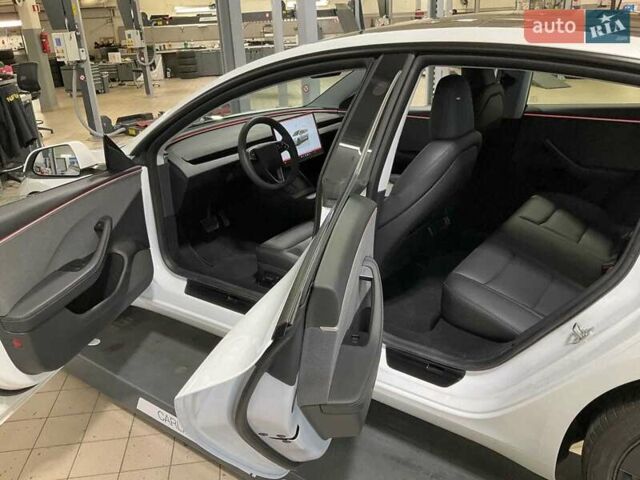 Тесла Модель 3 2024 у Києві на Automoto.ua Білий Тесла Модель 3, об'ємом двигуна 0 л та пробігом 14 тис. км за 28500 $, фото 20 на Automoto.ua