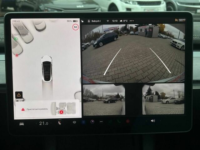 Білий Тесла Модель 3, об'ємом двигуна 0 л та пробігом 61 тис. км за 26999 $, фото 10 на Automoto.ua