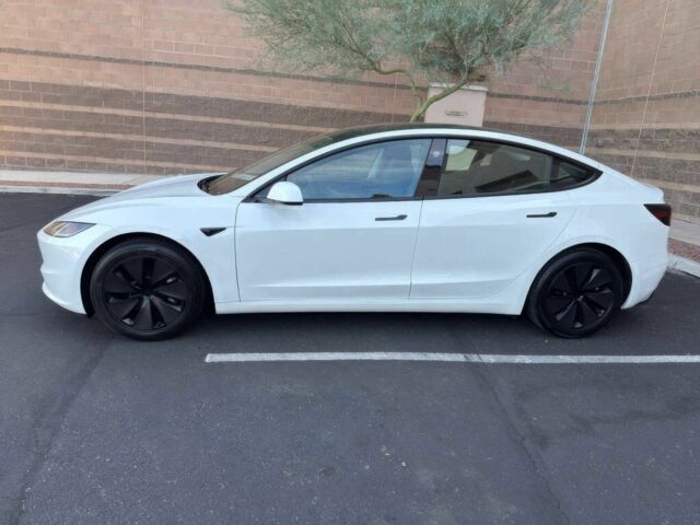 Белый Тесла Модель 3, объемом двигателя 0 л и пробегом 27 тыс. км за 14700 $, фото 3 на Automoto.ua