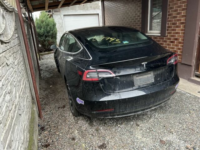 Чорний Тесла Модель 3, об'ємом двигуна 0 л та пробігом 77 тис. км за 12500 $, фото 4 на Automoto.ua