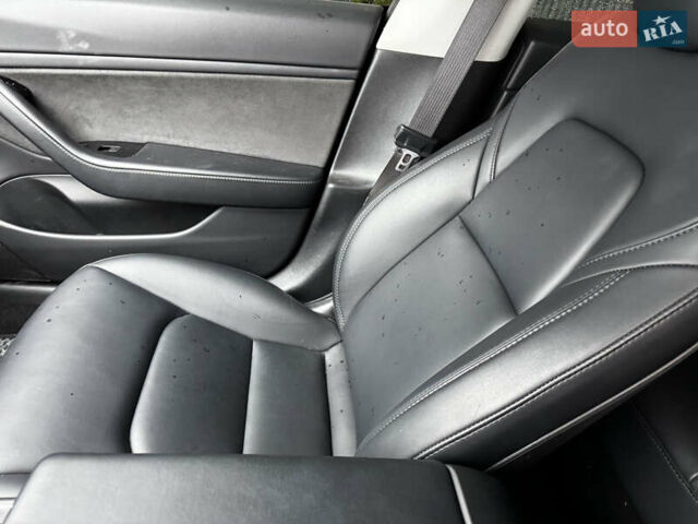 Черный Тесла Модель 3, объемом двигателя 0 л и пробегом 100 тыс. км за 19500 $, фото 4 на Automoto.ua