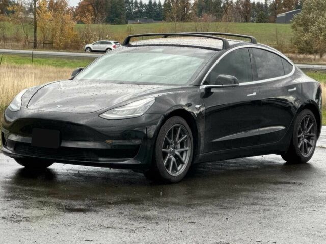 Черный Тесла Модель 3, объемом двигателя 0 л и пробегом 31 тыс. км за 12400 $, фото 2 на Automoto.ua