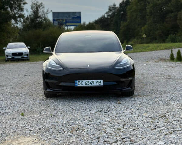 Черный Тесла Модель 3, объемом двигателя 0 л и пробегом 128 тыс. км за 16000 $, фото 1 на Automoto.ua