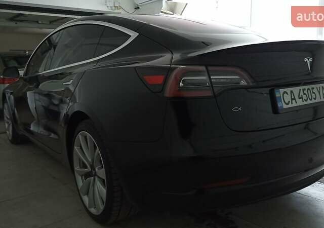 Тесла Модель 3 2018 у Умани на Automoto.ua Чорний Тесла Модель 3, об'ємом двигуна 0 л та пробігом 201 тис. км за 19000 $, фото 87 на Automoto.ua