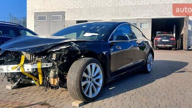 Черный Тесла Модель 3, объемом двигателя 0 л и пробегом 75 тыс. км за 8500 $, фото 1 на Automoto.ua