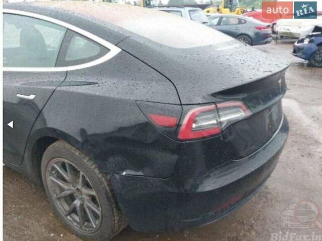 Чорний Тесла Модель 3, об'ємом двигуна 0 л та пробігом 176 тис. км за 15999 $, фото 2 на Automoto.ua