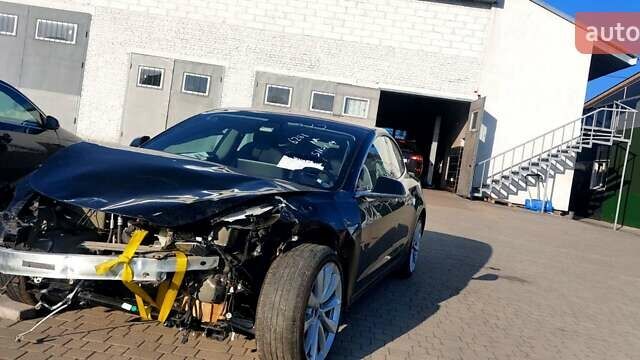 Черный Тесла Модель 3, объемом двигателя 0 л и пробегом 75 тыс. км за 8500 $, фото 2 на Automoto.ua
