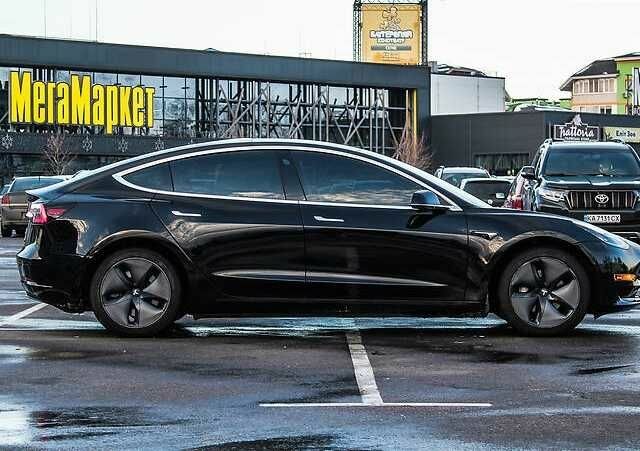 Тесла Модель 3 2018 в Рахове на Automoto.ua Черный Тесла Модель 3, объемом двигателя 0 л и пробегом 93 тыс. км за 14500 $, фото 3 на Automoto.ua