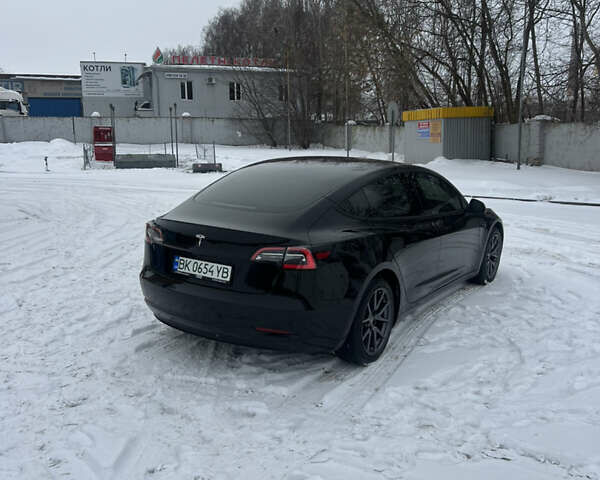 Черный Тесла Модель 3, объемом двигателя 0 л и пробегом 77 тыс. км за 12100 $, фото 5 на Automoto.ua