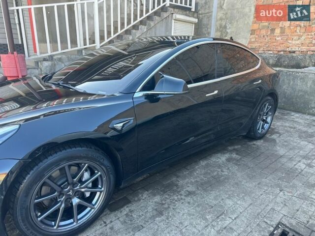 Чорний Тесла Модель 3, об'ємом двигуна 0 л та пробігом 124 тис. км за 12500 $, фото 2 на Automoto.ua