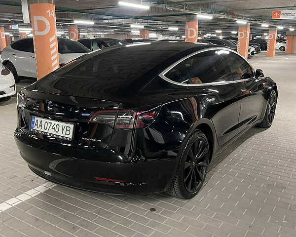 Тесла Модель 3 2019 в Киеве на Automoto.ua Черный Тесла Модель 3, объемом двигателя 0 л и пробегом 102 тыс. км за 19999 $, фото 4 на Automoto.ua