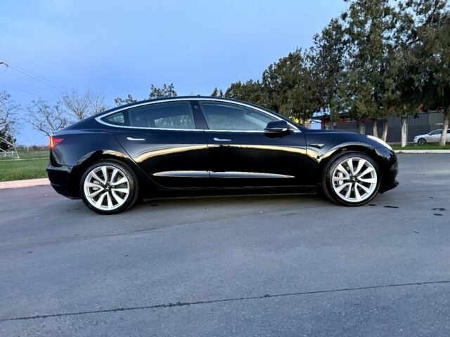 Чорний Тесла Модель 3, об'ємом двигуна 0 л та пробігом 128 тис. км за 372 $, фото 13 на Automoto.ua