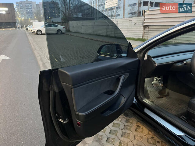 Черный Тесла Модель 3, объемом двигателя 0 л и пробегом 77 тыс. км за 20000 $, фото 64 на Automoto.ua