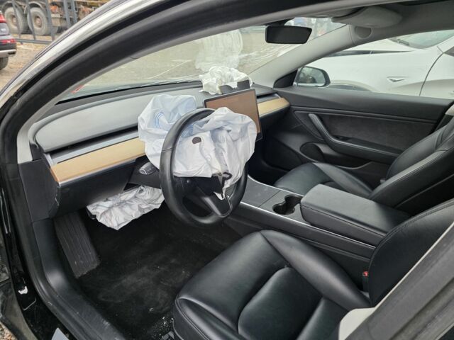 Черный Тесла Модель 3, объемом двигателя 0 л и пробегом 130 тыс. км за 303 $, фото 17 на Automoto.ua