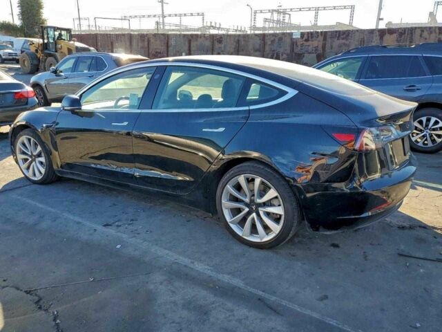 Черный Тесла Модель 3, объемом двигателя 0 л и пробегом 106 тыс. км за 4000 $, фото 1 на Automoto.ua