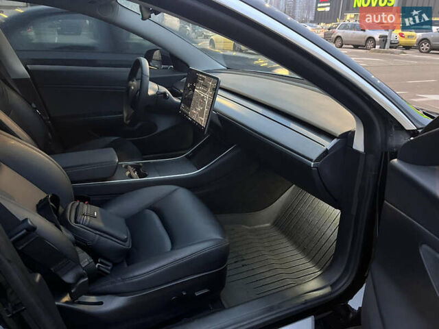 Черный Тесла Модель 3, объемом двигателя 0 л и пробегом 77 тыс. км за 20000 $, фото 86 на Automoto.ua