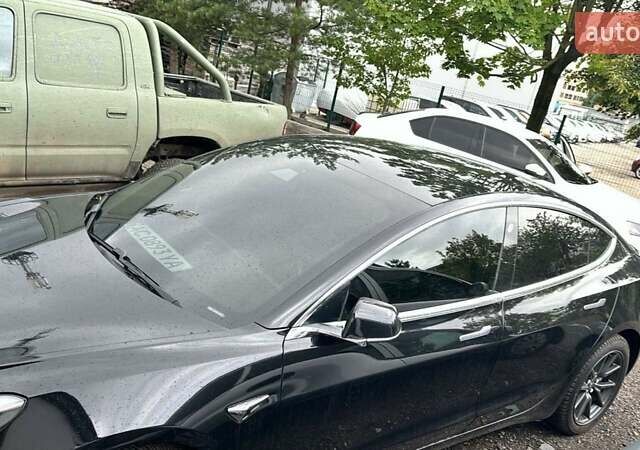 Черный Тесла Модель 3, объемом двигателя 0 л и пробегом 98 тыс. км за 20799 $, фото 5 на Automoto.ua