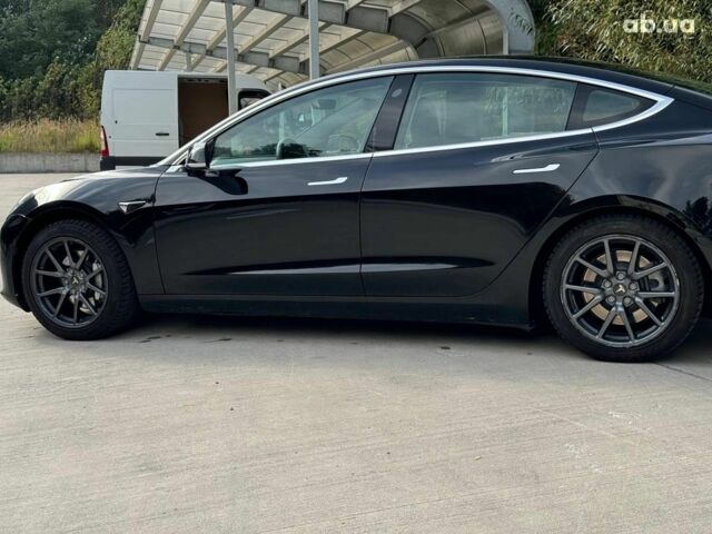 Черный Тесла Модель 3, объемом двигателя 0.1 л и пробегом 87 тыс. км за 18490 $, фото 7 на Automoto.ua