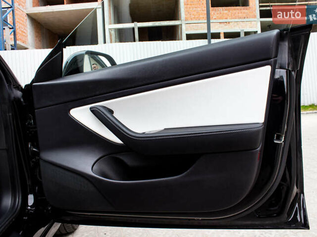 Тесла Модель 3 2021 у Львові на Automoto.ua Чорний Тесла Модель 3, об'ємом двигуна 0 л та пробігом 31 тис. км за 22500 $, фото 27 на Automoto.ua