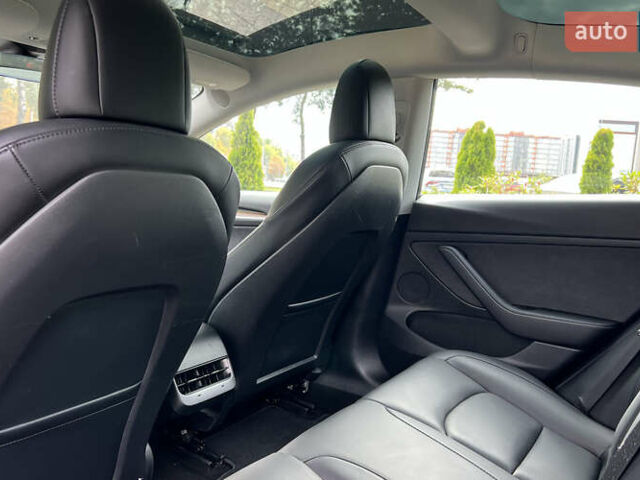 Тесла Модель 3 2022 у Львові на Automoto.ua Чорний Тесла Модель 3, об'ємом двигуна 0 л та пробігом 66 тис. км за 22750 $, фото 19 на Automoto.ua