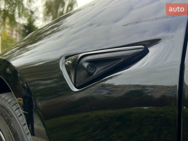 Тесла Модель 3 2022 у Львові на Automoto.ua Чорний Тесла Модель 3, об'ємом двигуна 0 л та пробігом 66 тис. км за 22750 $, фото 23 на Automoto.ua