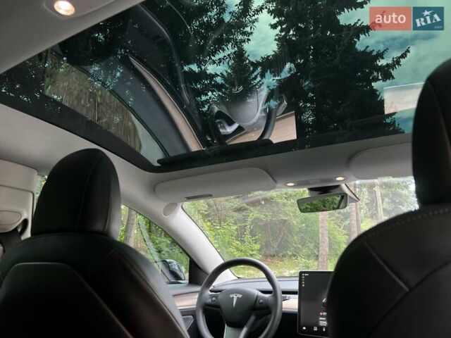 Тесла Модель 3 2022 у Львові на Automoto.ua Чорний Тесла Модель 3, об'ємом двигуна 0 л та пробігом 75 тис. км за 27500 $, фото 26 на Automoto.ua