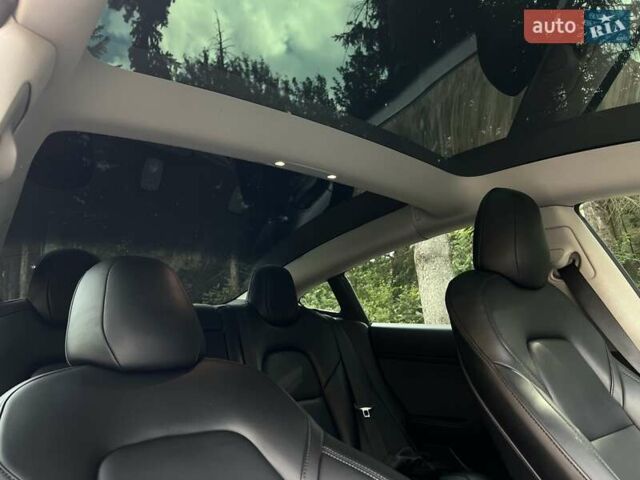 Тесла Модель 3 2022 у Львові на Automoto.ua Чорний Тесла Модель 3, об'ємом двигуна 0 л та пробігом 75 тис. км за 27500 $, фото 27 на Automoto.ua