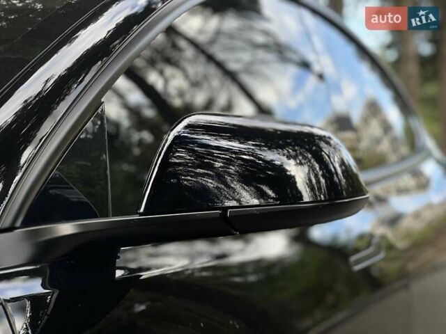 Тесла Модель 3 2022 у Львові на Automoto.ua Чорний Тесла Модель 3, об'ємом двигуна 0 л та пробігом 75 тис. км за 27500 $, фото 11 на Automoto.ua