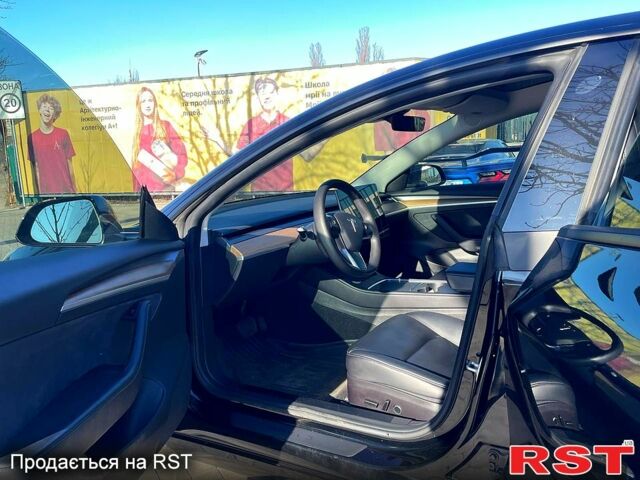 Чорний Тесла Модель 3, об'ємом двигуна 0.44 л та пробігом 55 тис. км за 23500 $, фото 8 на Automoto.ua
