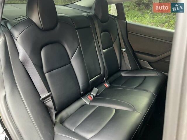 Тесла Модель 3 2022 у Львові на Automoto.ua Чорний Тесла Модель 3, об'ємом двигуна 0 л та пробігом 75 тис. км за 27500 $, фото 33 на Automoto.ua