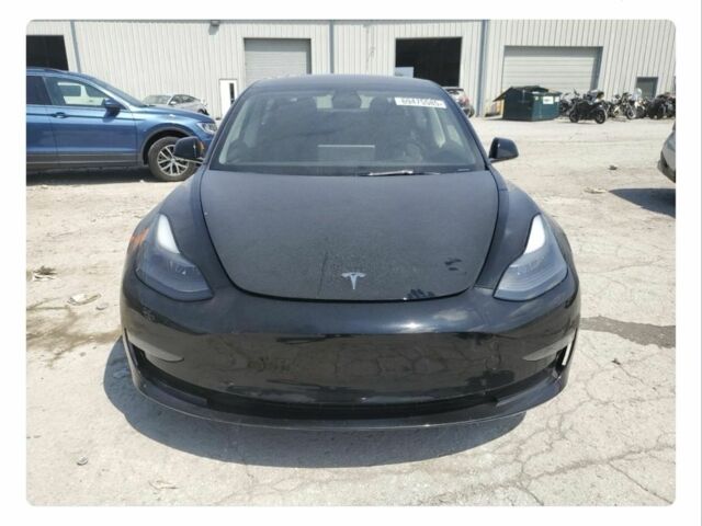 Черный Тесла Модель 3, объемом двигателя 0 л и пробегом 56 тыс. км за 17000 $, фото 1 на Automoto.ua