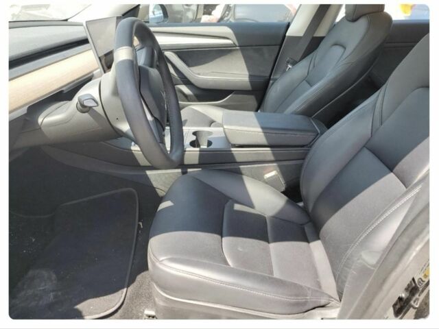 Черный Тесла Модель 3, объемом двигателя 0 л и пробегом 56 тыс. км за 17000 $, фото 2 на Automoto.ua