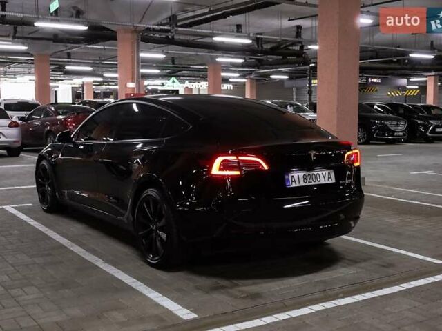 Чорний Тесла Модель 3, об'ємом двигуна 0 л та пробігом 49 тис. км за 24999 $, фото 4 на Automoto.ua