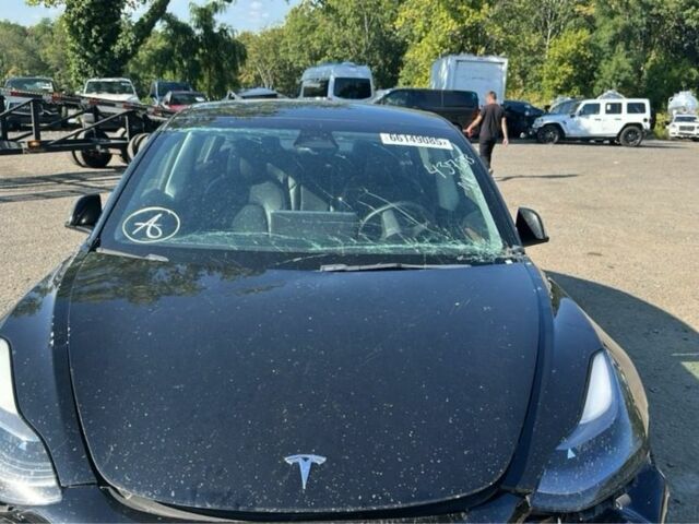 Черный Тесла Модель 3, объемом двигателя 0 л и пробегом 80 тыс. км за 8900 $, фото 3 на Automoto.ua