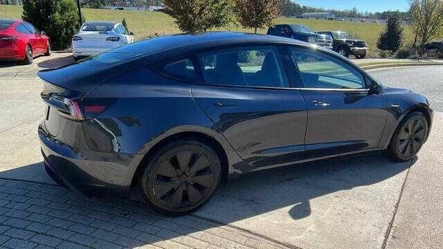 Черный Тесла Модель 3, объемом двигателя 0 л и пробегом 10 тыс. км за 12400 $, фото 2 на Automoto.ua