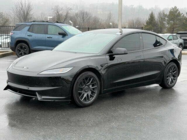 Черный Тесла Модель 3, объемом двигателя 0 л и пробегом 4 тыс. км за 15200 $, фото 2 на Automoto.ua