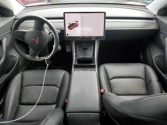 Черный Тесла Модель 3, объемом двигателя 1 л и пробегом 60 тыс. км за 4800 $, фото 2 на Automoto.ua