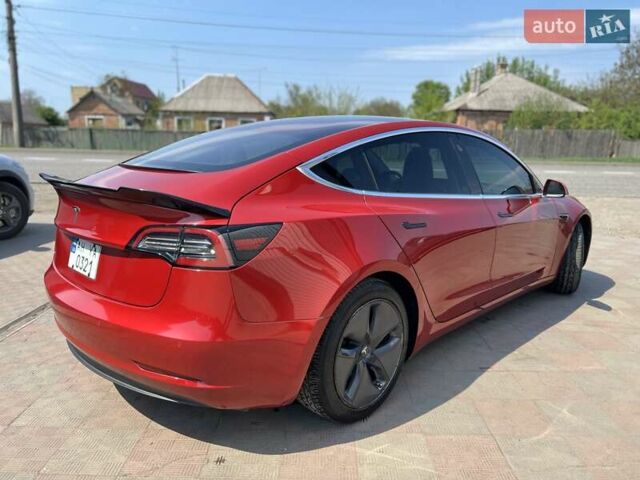 Червоний Тесла Модель 3, об'ємом двигуна 0 л та пробігом 98 тис. км за 22600 $, фото 3 на Automoto.ua
