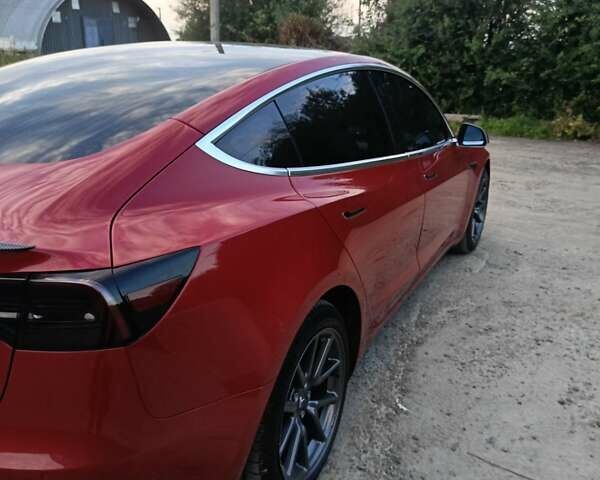 Красный Тесла Модель 3, объемом двигателя 0 л и пробегом 135 тыс. км за 20100 $, фото 6 на Automoto.ua