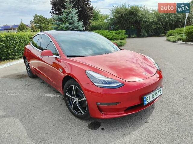 Красный Тесла Модель 3, объемом двигателя 0 л и пробегом 53 тыс. км за 15800 $, фото 3 на Automoto.ua