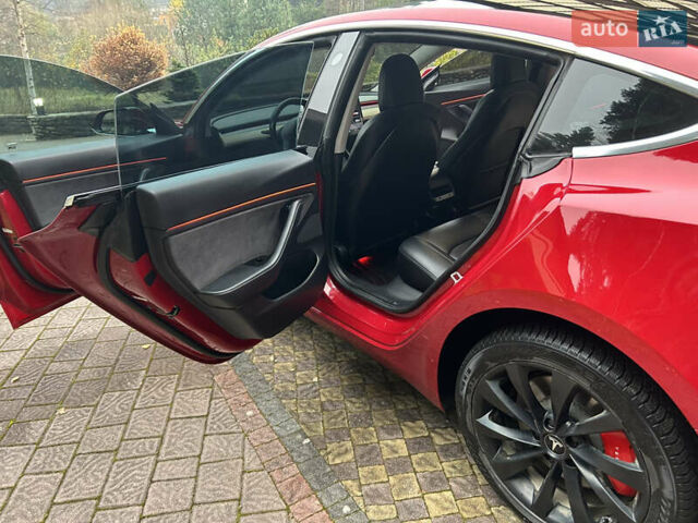 Красный Тесла Модель 3, объемом двигателя 0 л и пробегом 129 тыс. км за 20999 $, фото 28 на Automoto.ua