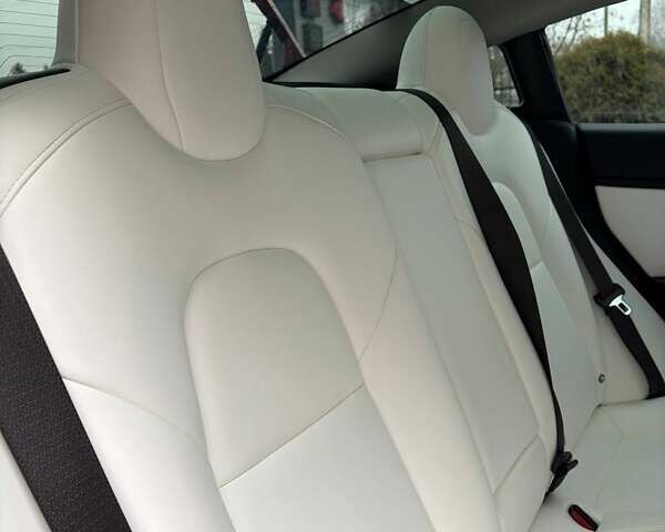 Красный Тесла Модель 3, объемом двигателя 0 л и пробегом 112 тыс. км за 16500 $, фото 46 на Automoto.ua