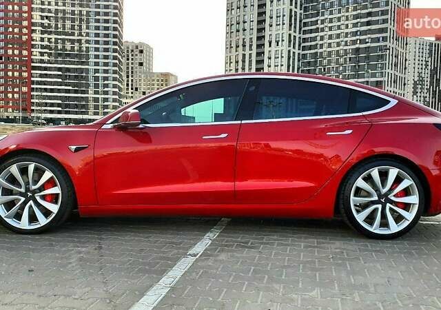 Красный Тесла Модель 3, объемом двигателя 0 л и пробегом 115 тыс. км за 28980 $, фото 3 на Automoto.ua