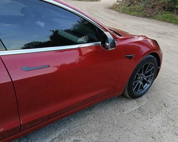Красный Тесла Модель 3, объемом двигателя 0 л и пробегом 135 тыс. км за 20100 $, фото 11 на Automoto.ua