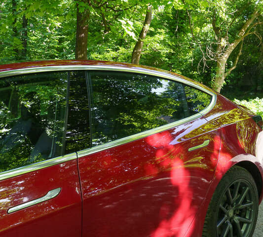 Красный Тесла Модель 3, объемом двигателя 0 л и пробегом 82 тыс. км за 29000 $, фото 7 на Automoto.ua