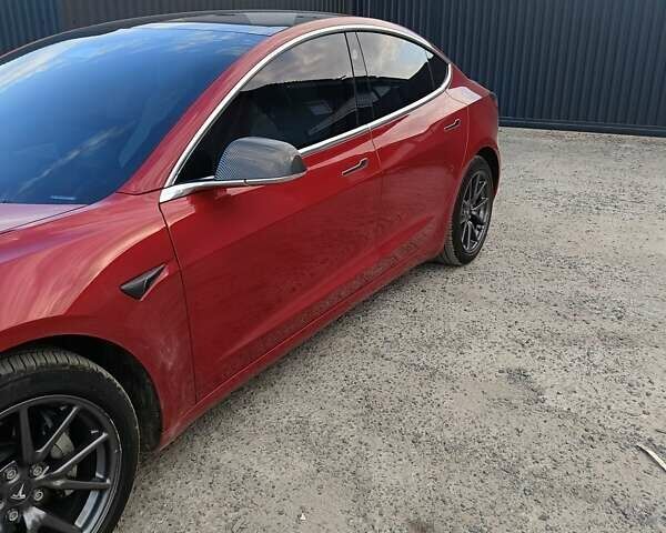 Красный Тесла Модель 3, объемом двигателя 0 л и пробегом 135 тыс. км за 20100 $, фото 3 на Automoto.ua