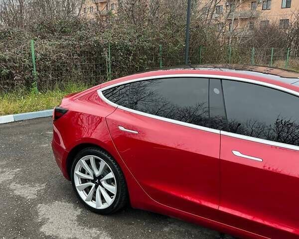 Красный Тесла Модель 3, объемом двигателя 0 л и пробегом 91 тыс. км за 18500 $, фото 2 на Automoto.ua