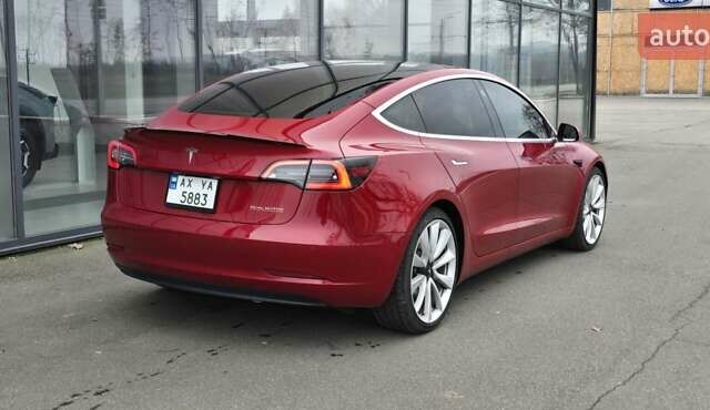 Красный Тесла Модель 3, объемом двигателя 0 л и пробегом 148 тыс. км за 17200 $, фото 2 на Automoto.ua