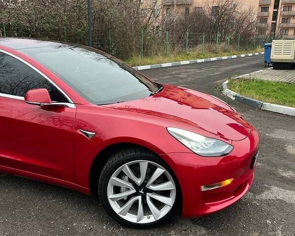 Красный Тесла Модель 3, объемом двигателя 0 л и пробегом 91 тыс. км за 18500 $, фото 1 на Automoto.ua