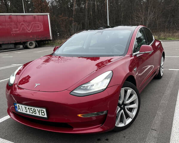 Красный Тесла Модель 3, объемом двигателя 0 л и пробегом 77 тыс. км за 17000 $, фото 1 на Automoto.ua